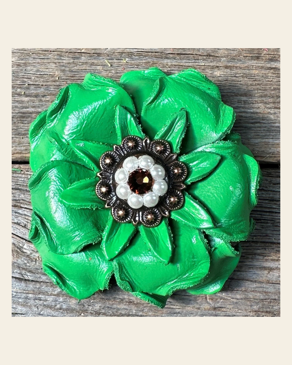 Neon Green Gardenia Flower With Copper Topaz & Pearl 1" Concho on a warm cream background