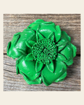 Neon Green Gardenia Leather Flower on a warm cream background