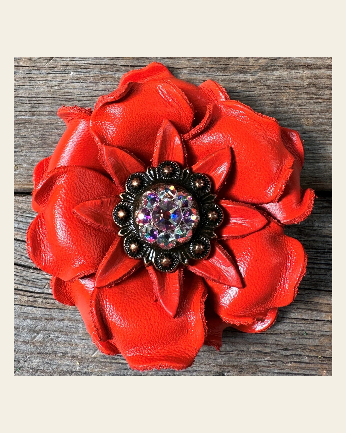 Neon Orange Gardenia Flower With Copper AB 1" Concho on a warm cream background