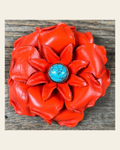 Neon Orange Gardenia Flower With Round Turquoise Cabochon on a warm cream background