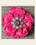 Neon Pink Gardenia Flower With Bright Silver Pink & AB 1" Concho on a warm cream background