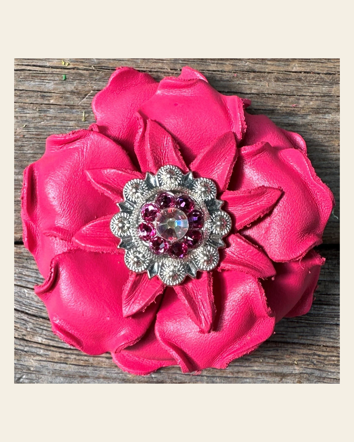 Neon Pink Gardenia Flower With Bright Silver Pink & AB 1" Concho on a warm cream background