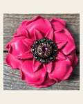 Neon Pink Gardenia Flower With Copper Pink & Champagne 1" Concho on a warm cream background