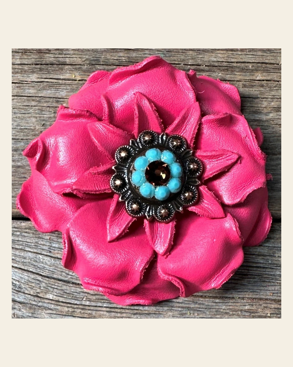 Neon Pink Gardenia Flower With Copper Topaz & Turquoise 1" Concho on a warm cream background