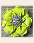 Neon Lime Gardenia Flower With Antique Silver Clear 1" Concho on a warm cream background