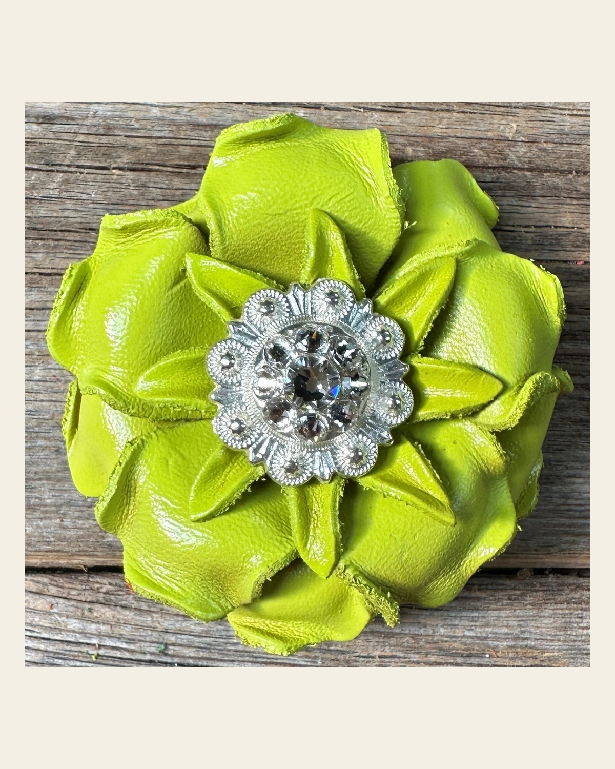 Neon Lime Gardenia Flower With Bright Silver Clear 1" Concho on a warm cream background