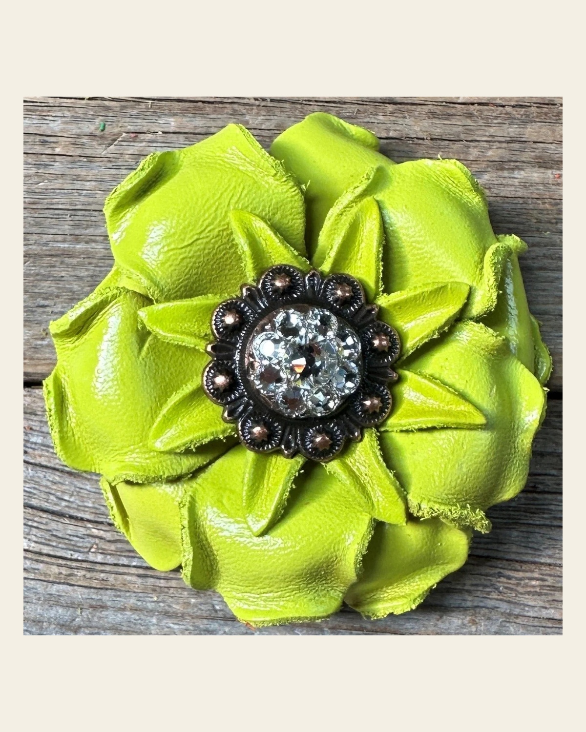 Neon Lime Gardenia Flower With Copper Clear 1" Concho on a warm cream background
