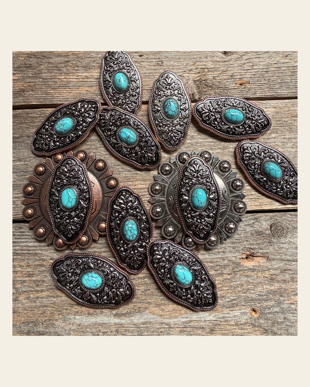 Oblong Antique Silver and Copper Turquoise Western Conchos W254 on a warm cream background