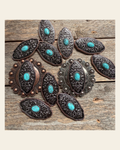 Oblong Antique Silver and Copper Turquoise Western Conchos W254 on a warm cream background