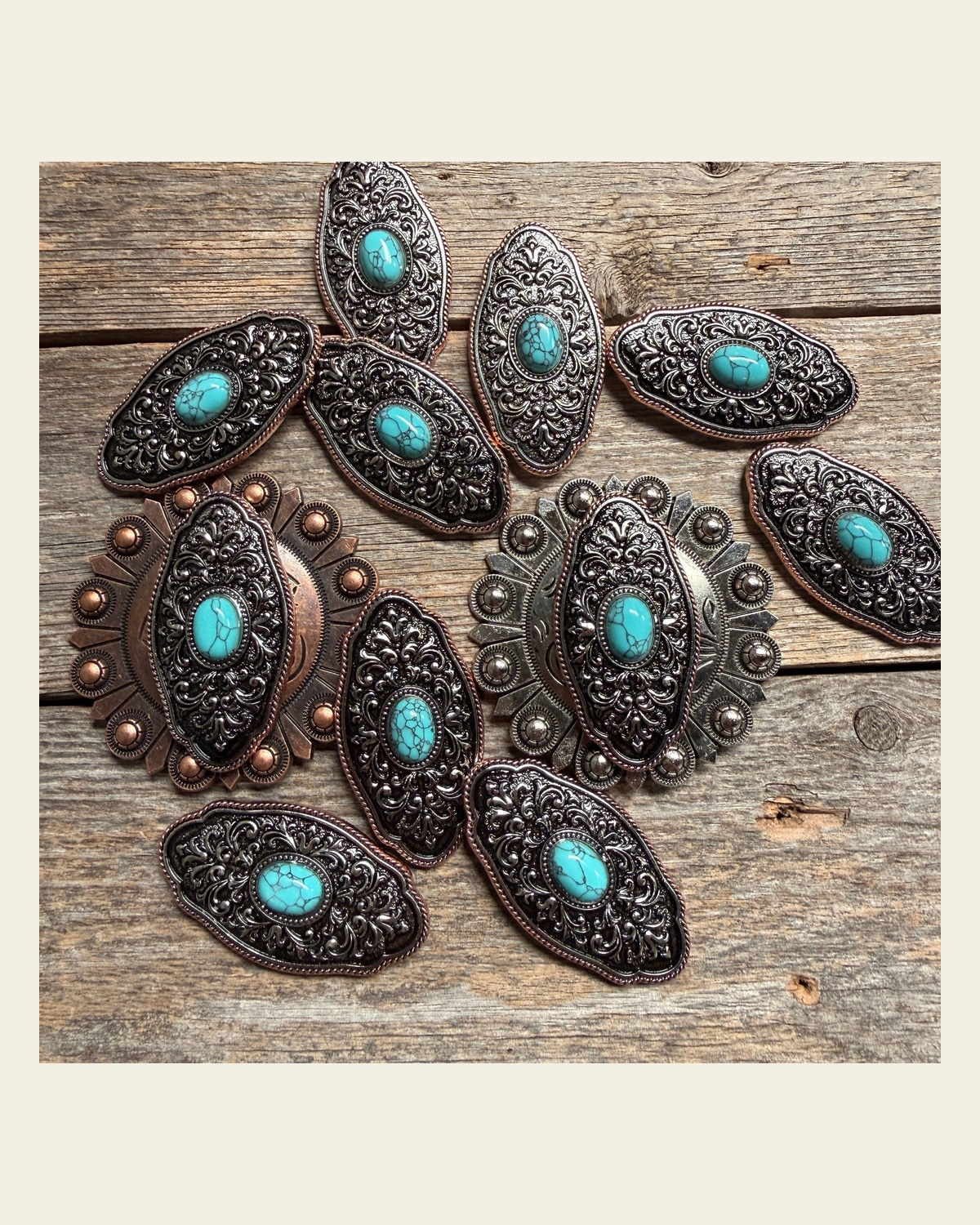 Oblong Antique Silver and Copper Turquoise Western Conchos W254 on a warm cream background