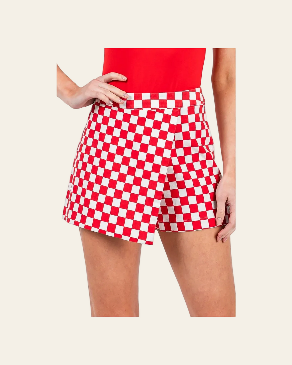 Off To The Races Checkered Wrap | Skort on a warm cream background