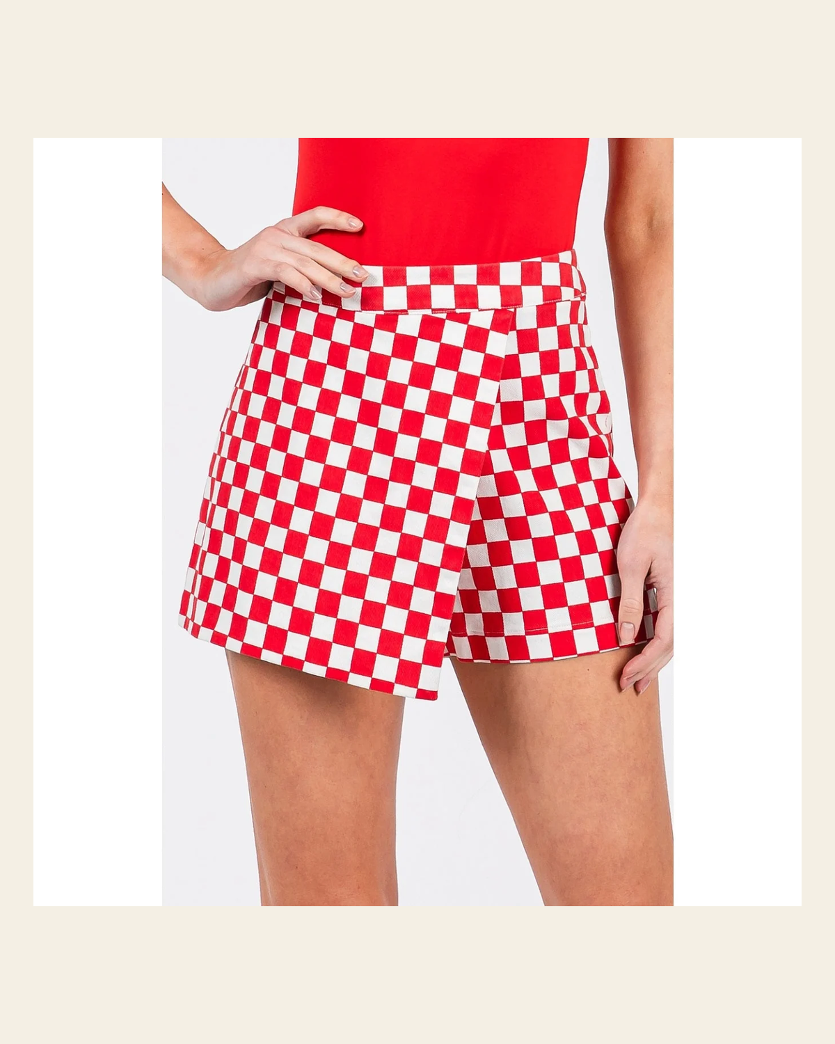 Off To The Races Checkered Wrap | Skort on a warm cream background