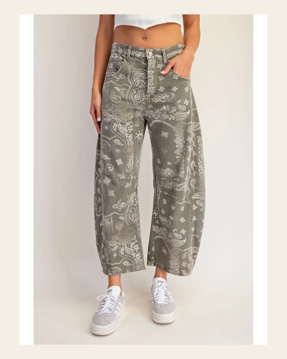 Olivia Barrel | Jeans on a warm cream background