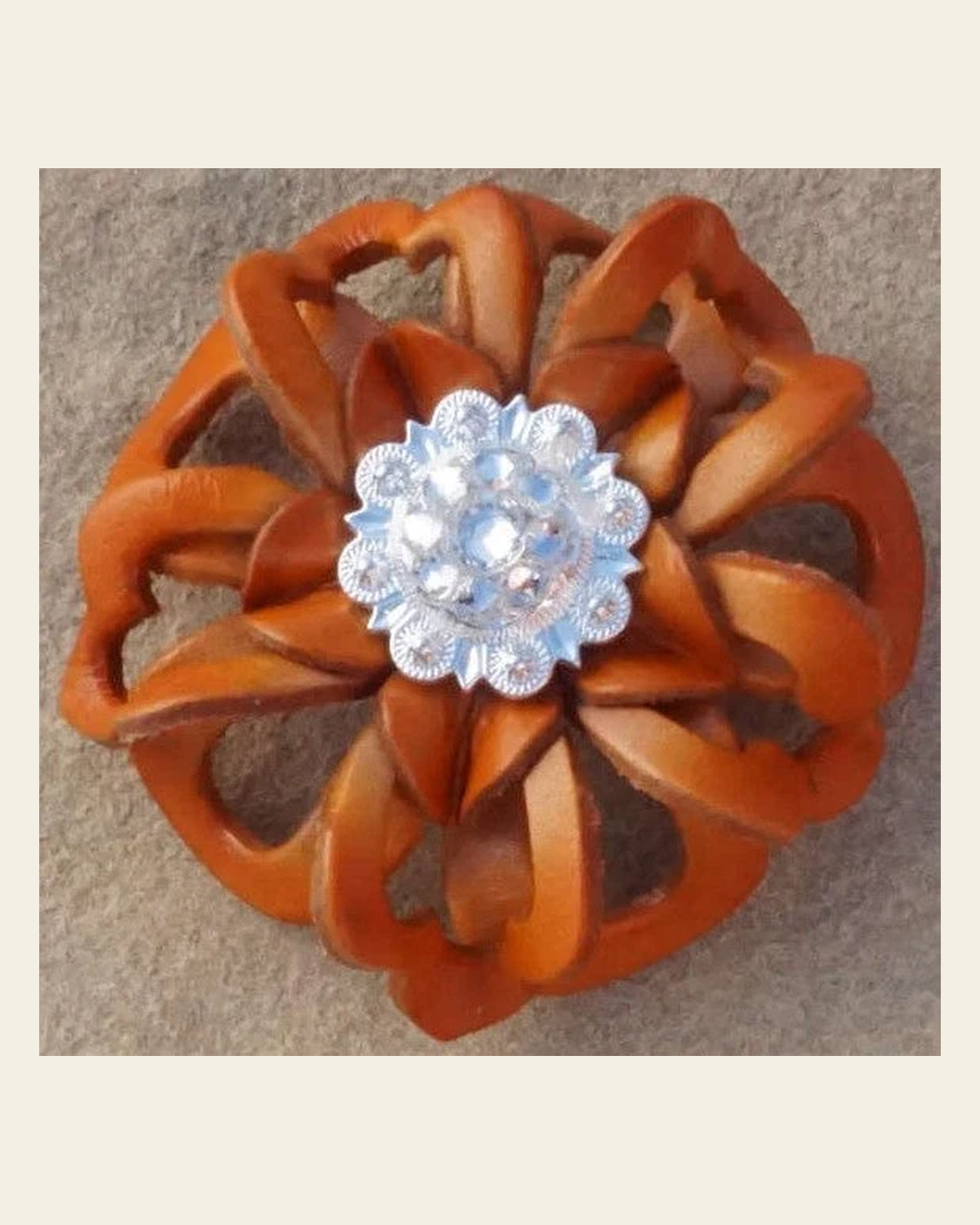 Orange Lotus Flower With Bright Silver Clear 1" Concho on a warm cream background