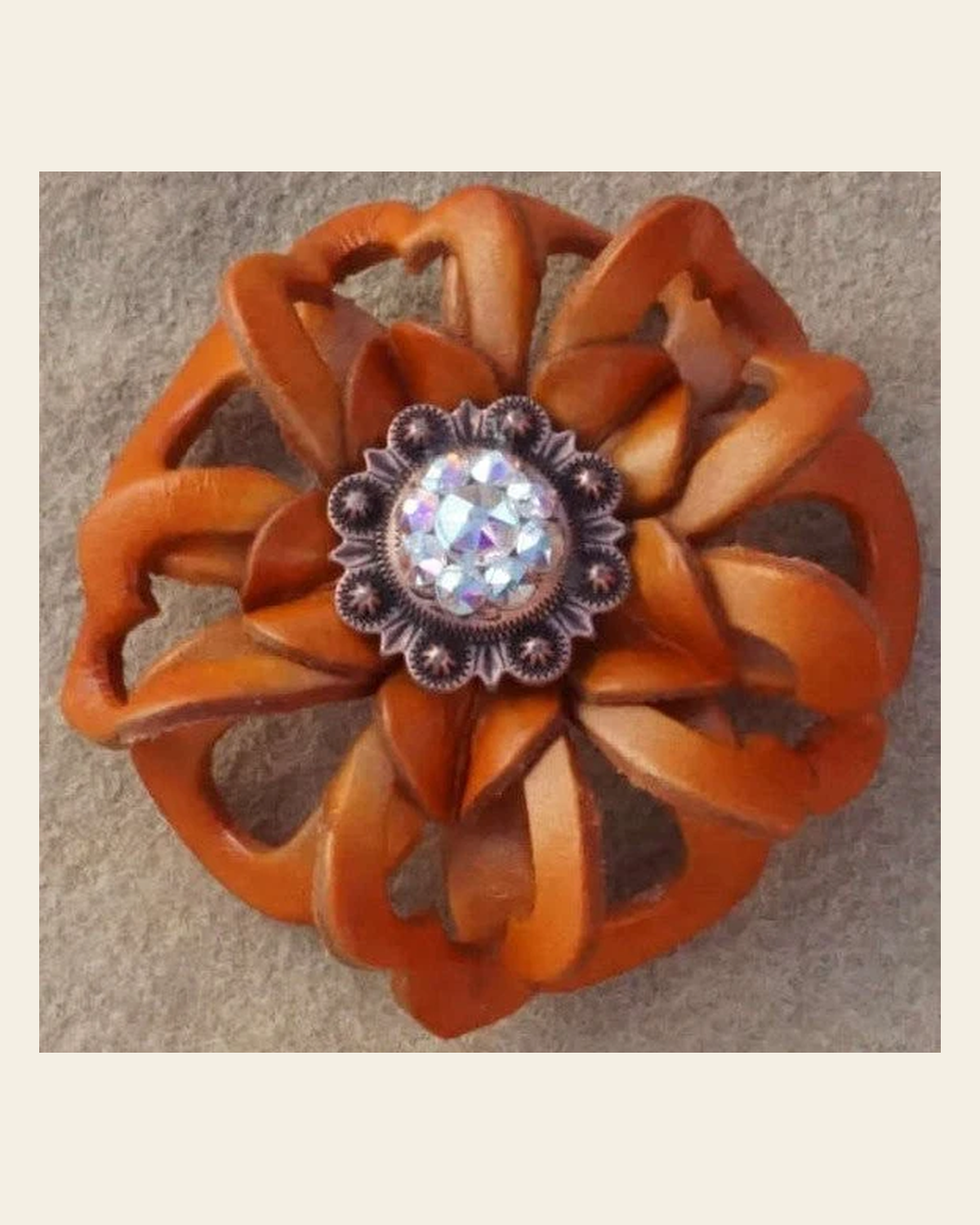 Orange Lotus Flower With Copper AB 1" Concho on a warm cream background