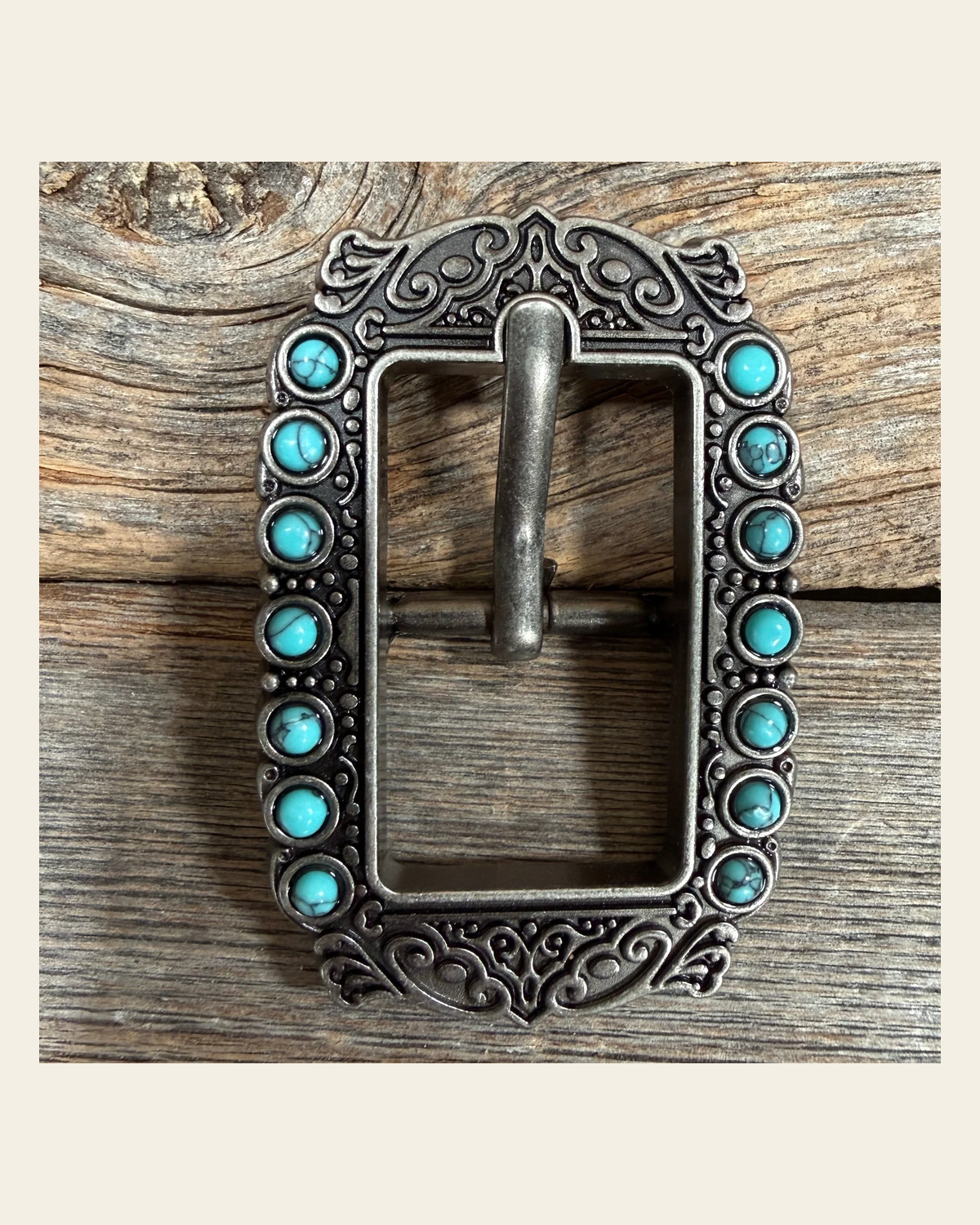 Ornate Antique Silver Cart Buckle with Turquoise Stones W271B on a warm cream background