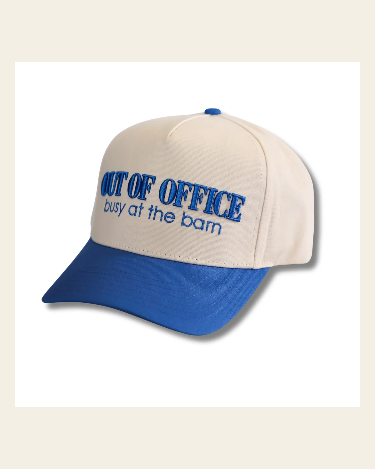 Out Of Office Hat on a warm cream background