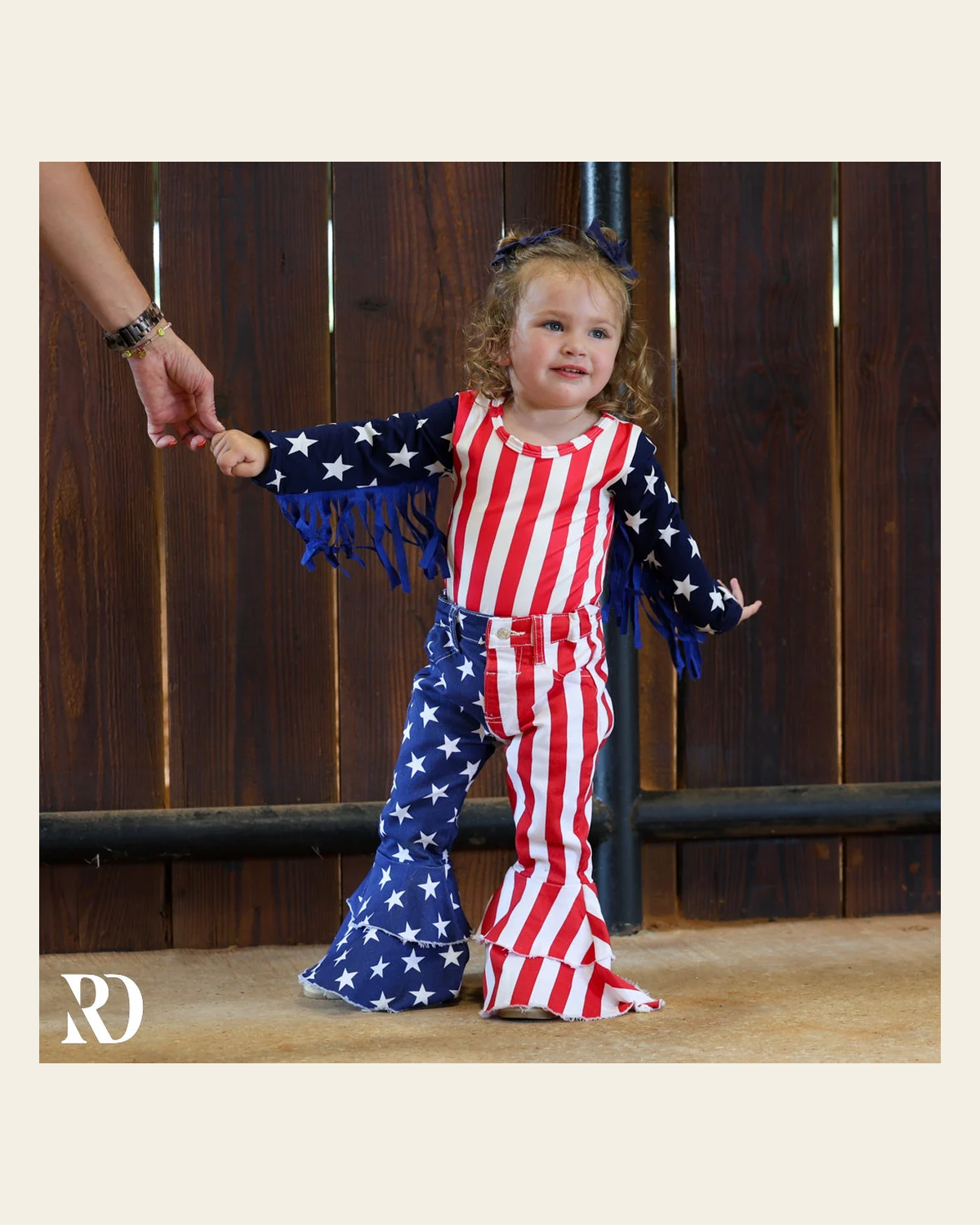 Patriotic Fringe Infant / Toddler Bodysuit on a warm cream background