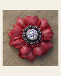 Pink Carnation Flower With Antique Silver AB 1" Concho on a warm cream background