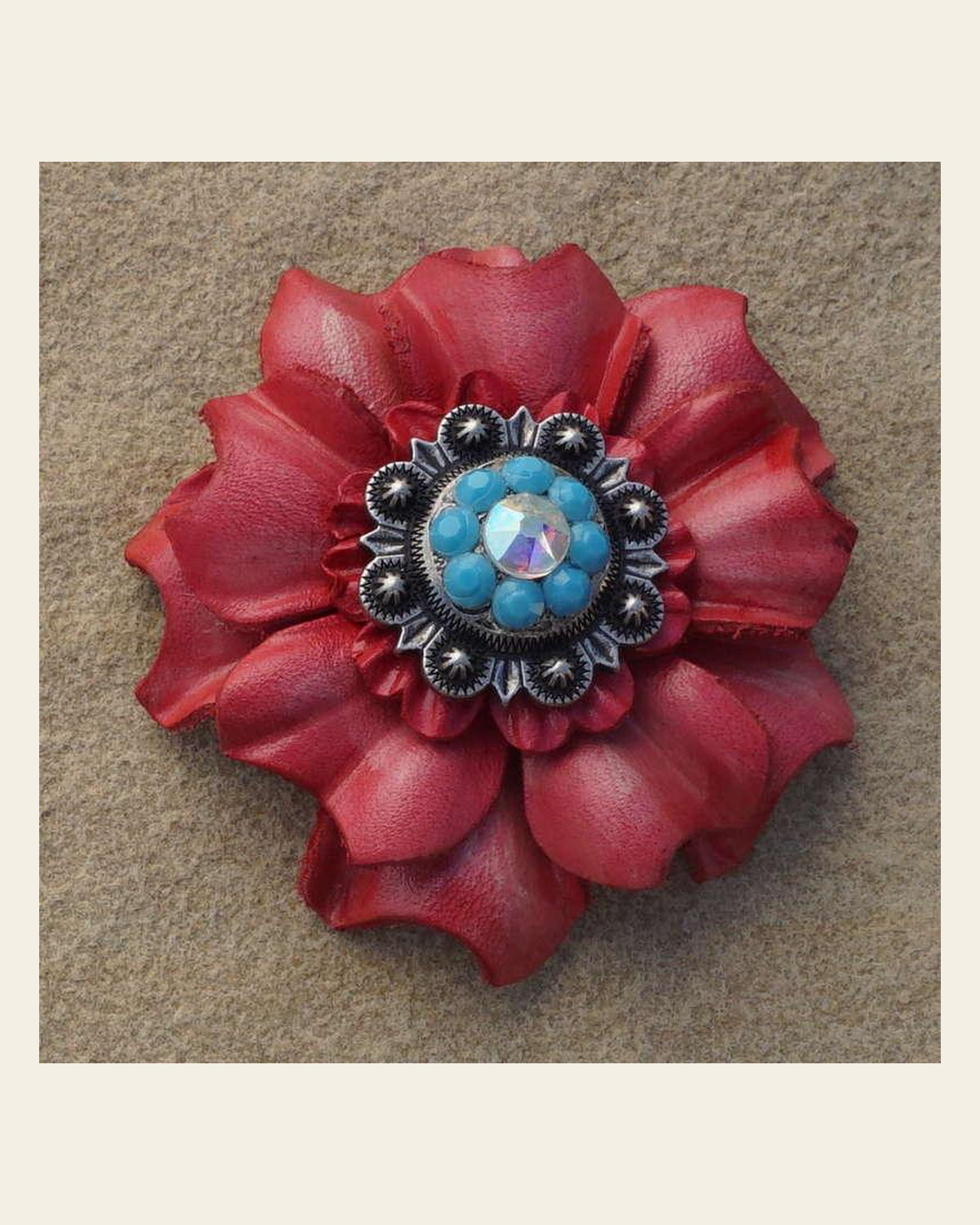 Pink Carnation Flower With Antique Silver Turquoise and AB 1" Concho on a warm cream background