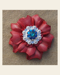 Pink Carnation Flower With Bright Silver Teal and Capri 1" Concho on a warm cream background