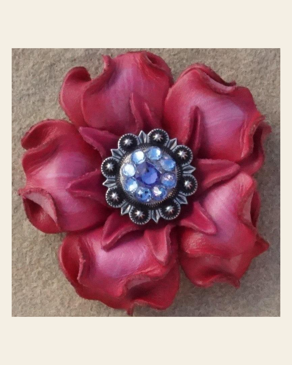 Pink Gardenia Flower With Antique Silver Lilac and Light Sapphire 1" Concho on a warm cream background