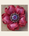 Pink Gardenia Flower With Copper Fuchsia & Lilac 1" Concho on a warm cream background
