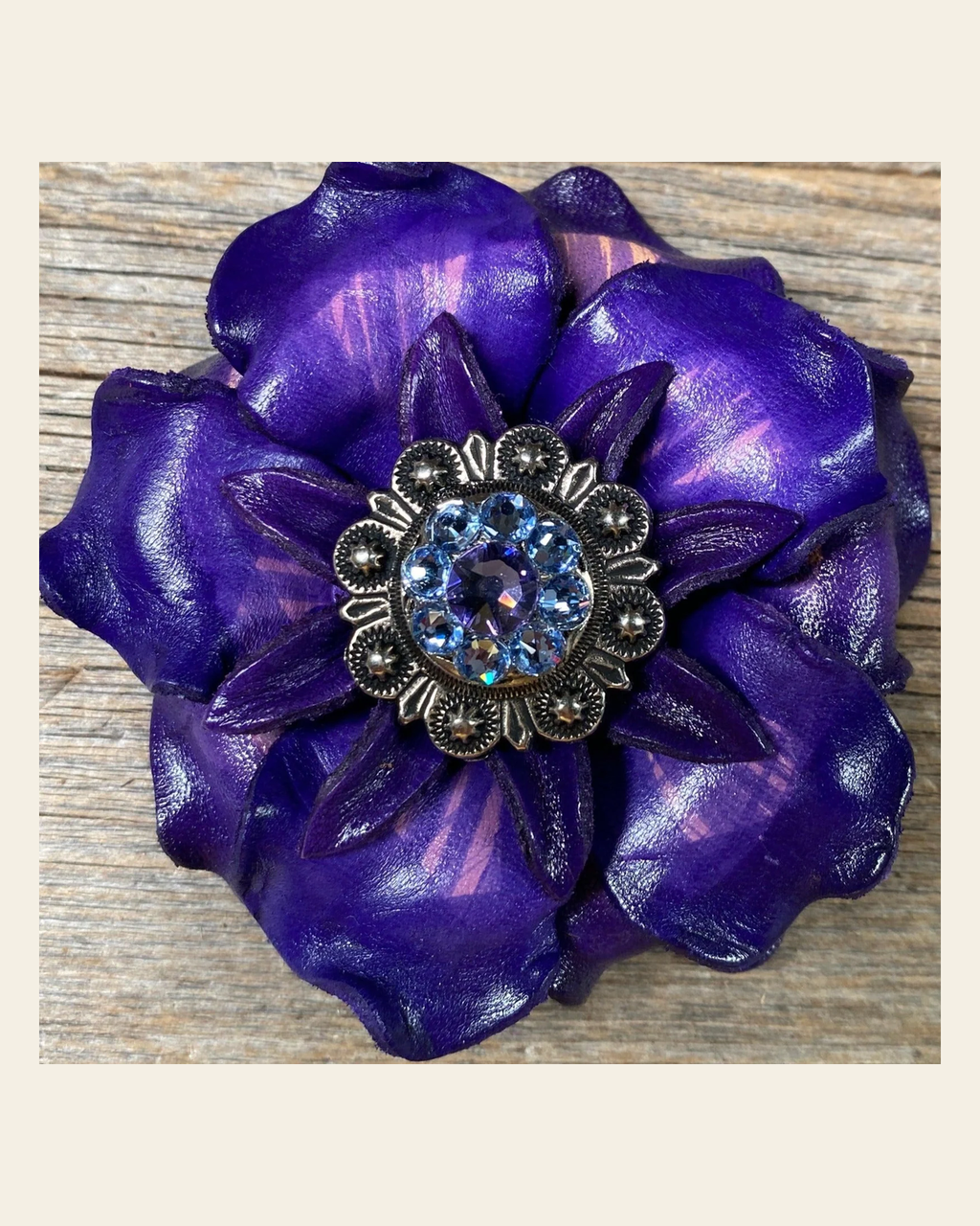 Purple Gardenia Flower With Antique Silver Lilac & Light Sapphire 1" Concho on a warm cream background