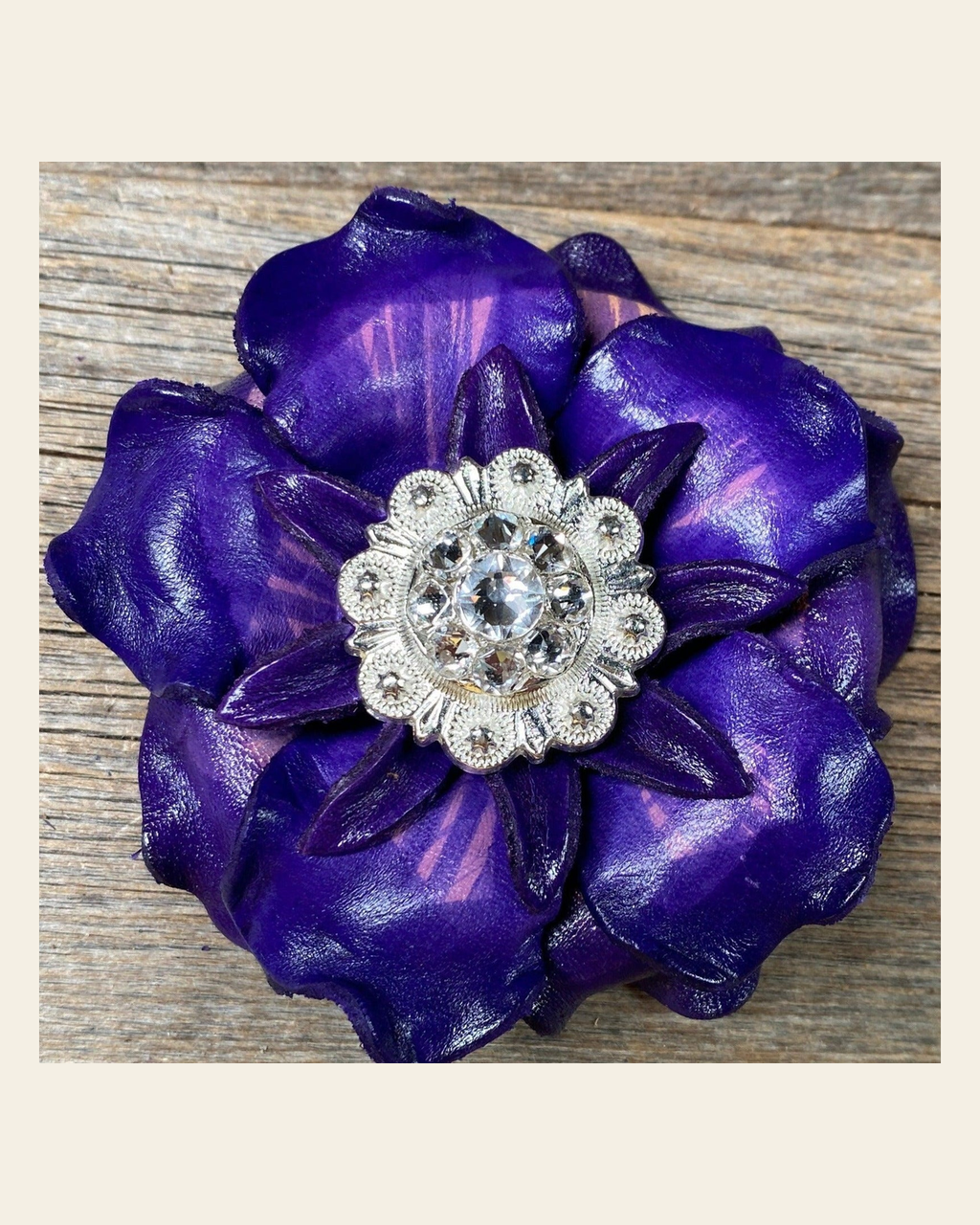 Purple Gardenia Flower With Bright Silver Clear 1" Concho on a warm cream background