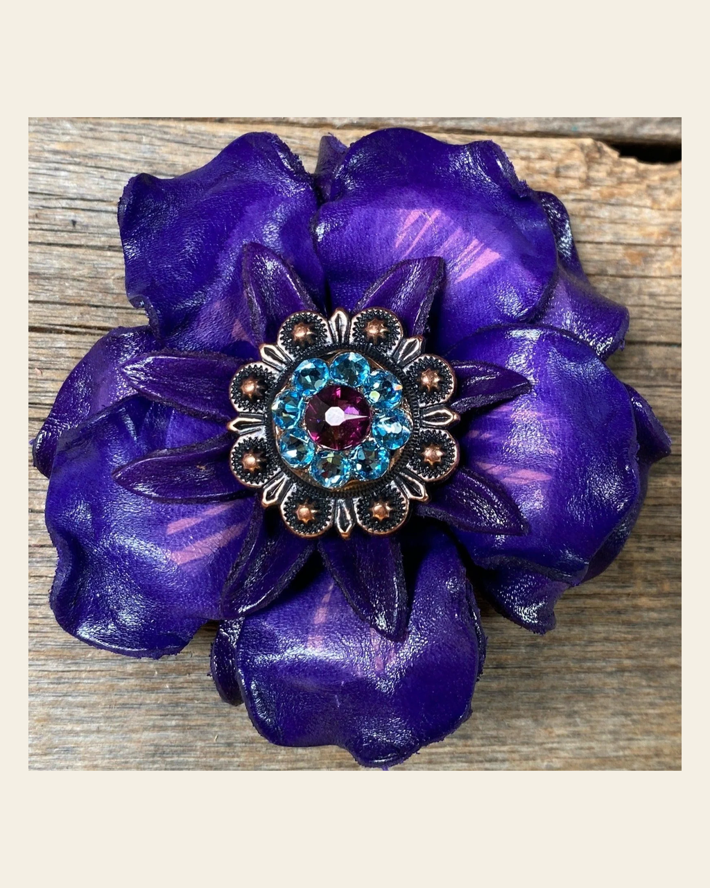 Purple Gardenia Flower With Copper Amethyst & Aqua 1" Concho on a warm cream background