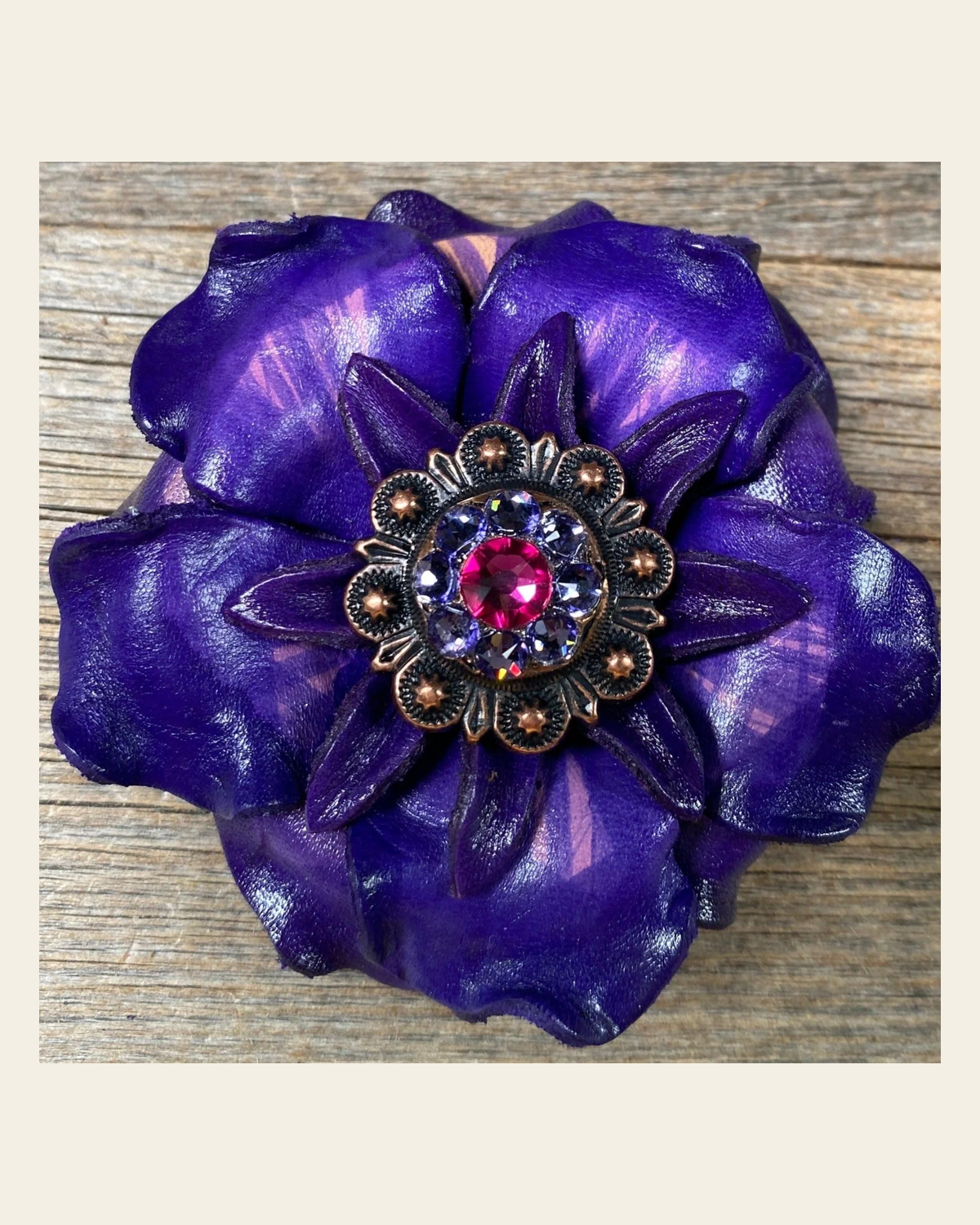 Purple Gardenia Flower With Copper Fuchsia & Lilac 1" Concho on a warm cream background