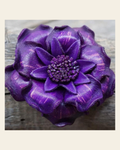 Purple Gardenia Leather Flower on a warm cream background