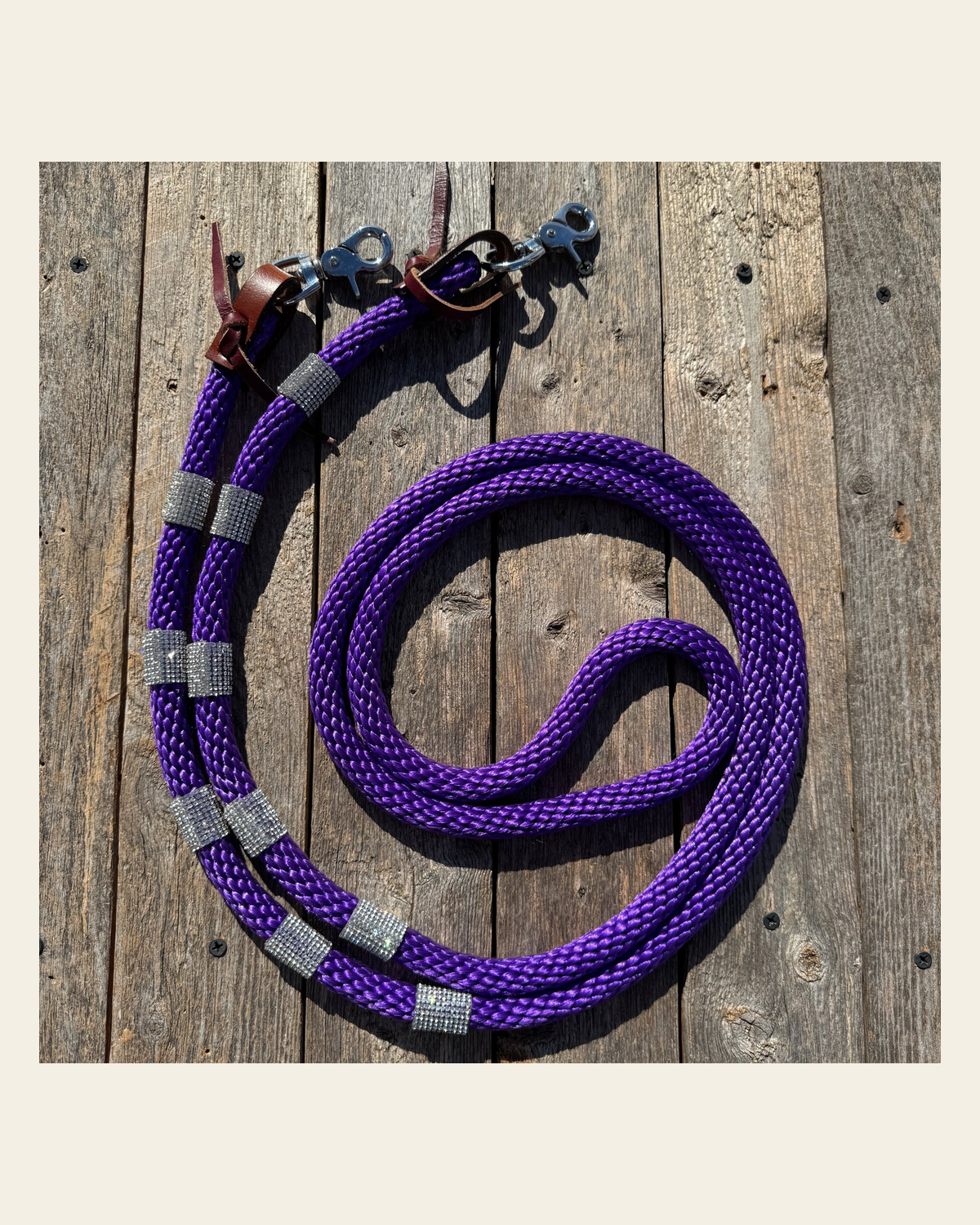 Purple Nylon Barrel Racing Reins with Rhinestones #BNR101 on a warm cream background