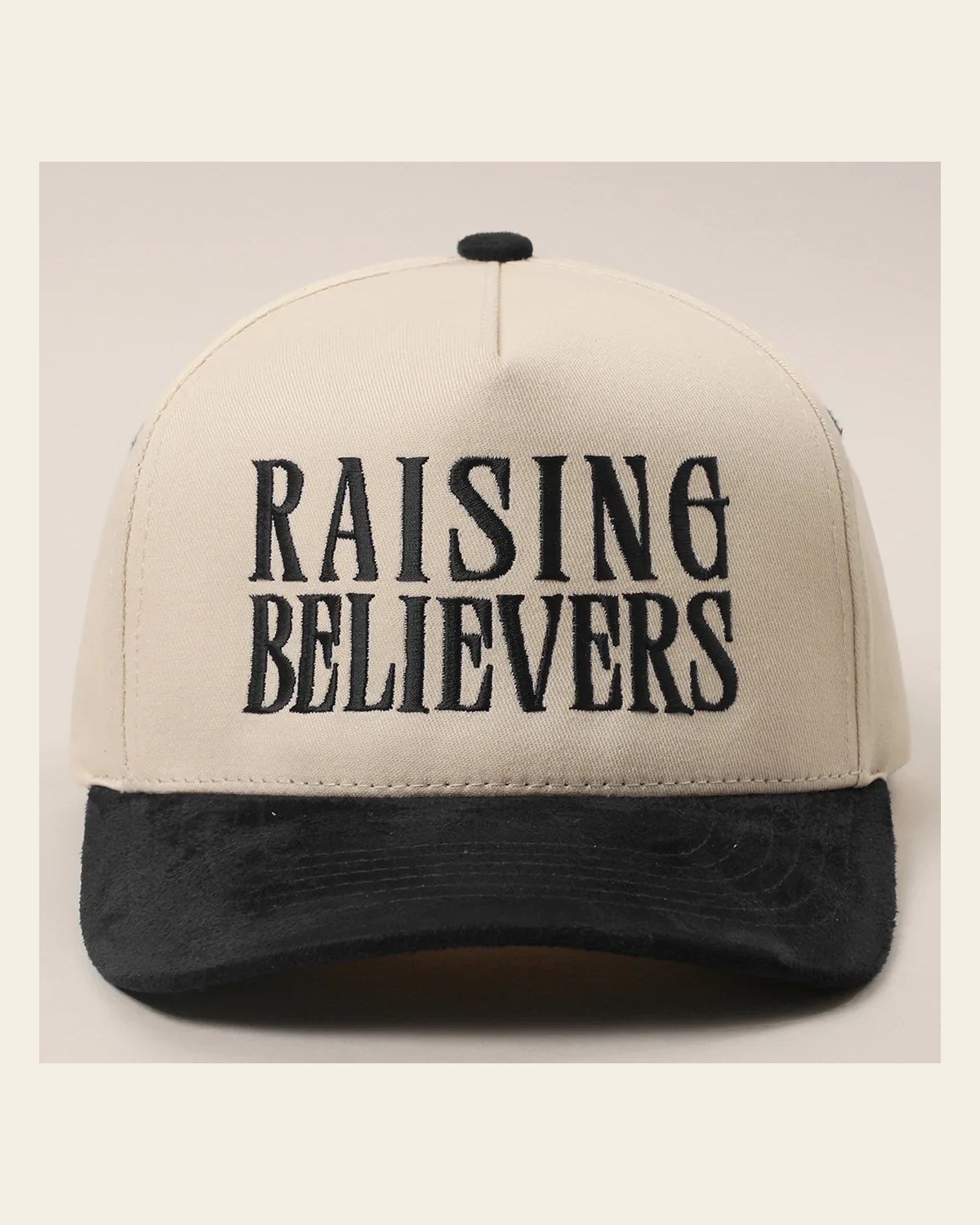Raising Believers Suede | Cap on a warm cream background