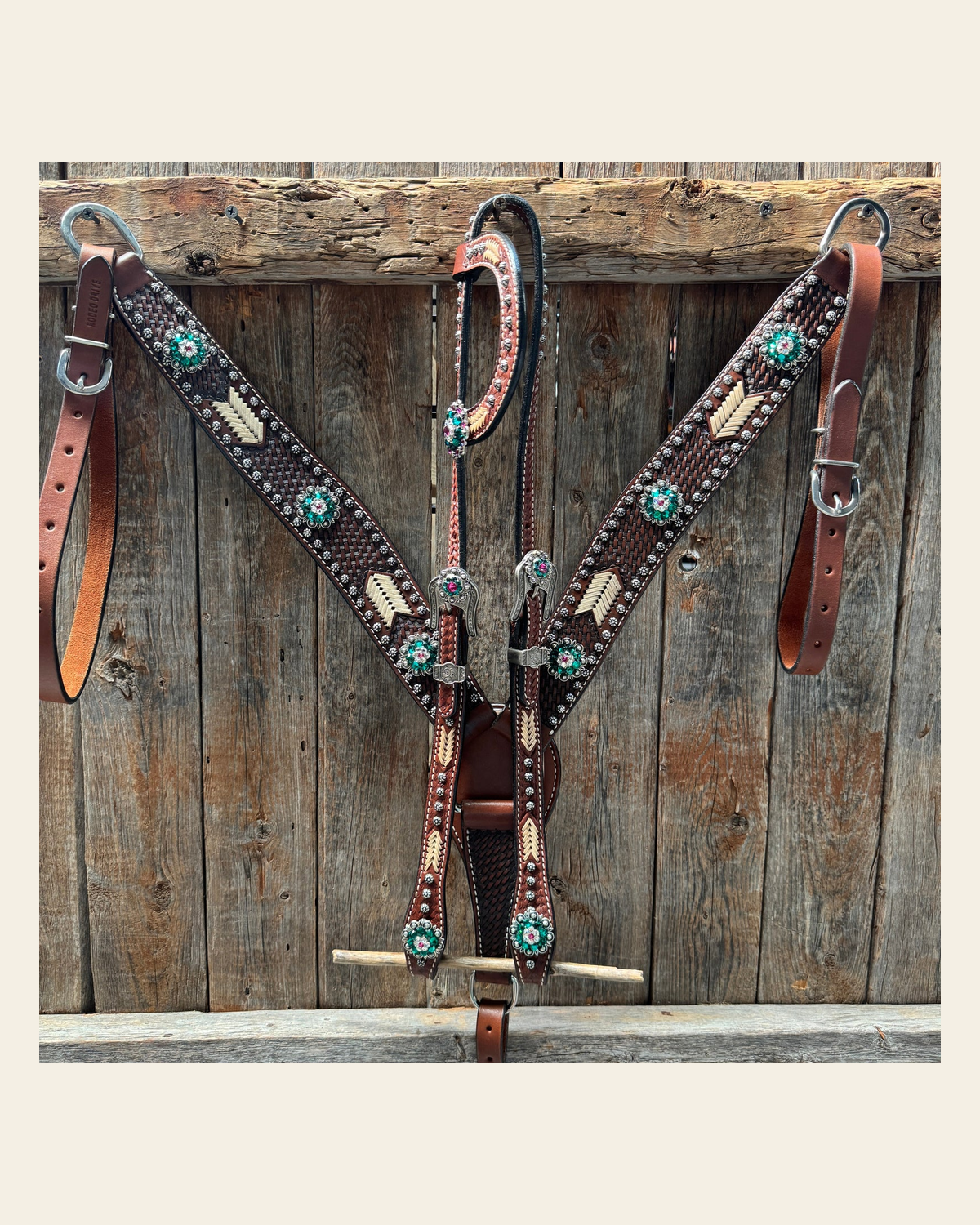 Rawhide Fuchsia, Clear and Emerald One Ear Headstall and Breastcollar Tack Set #OEBC412 on a warm cream background