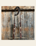 Rawhide One Ear Headstall / Bridle on a warm cream background