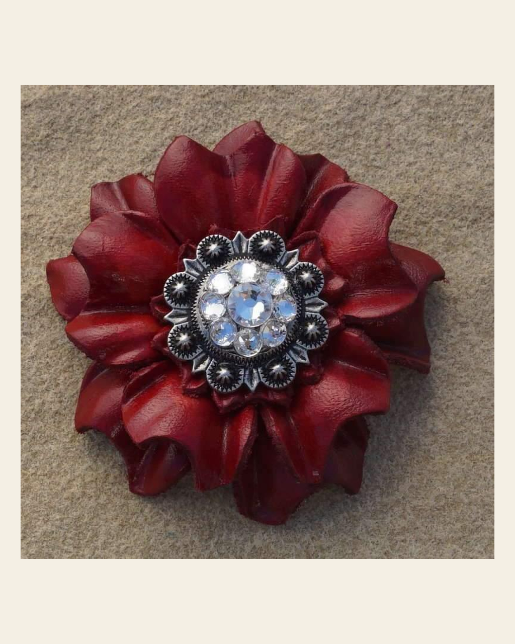 Red Carnation Flower With Antique Silver Clear 1" Concho on a warm cream background