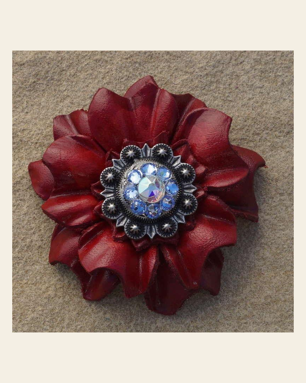 Red Carnation Flower With Antique Silver Light Sapphire and AB 1" Concho on a warm cream background
