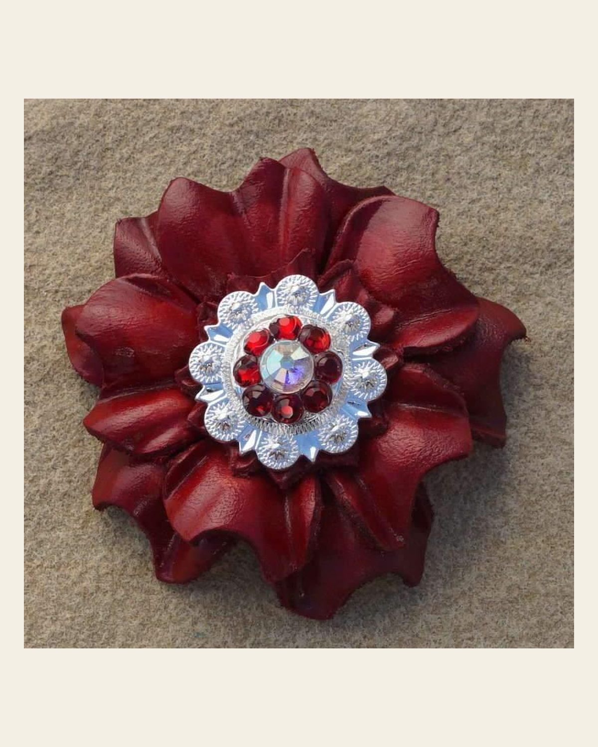 Red Carnation Flower With Bright Silver Ruby & AB 1" Concho on a warm cream background