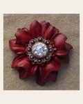 Red Carnation Flower With Copper AB 1" Concho on a warm cream background