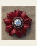 Red Carnation Flower With Copper Clear 1" Concho on a warm cream background