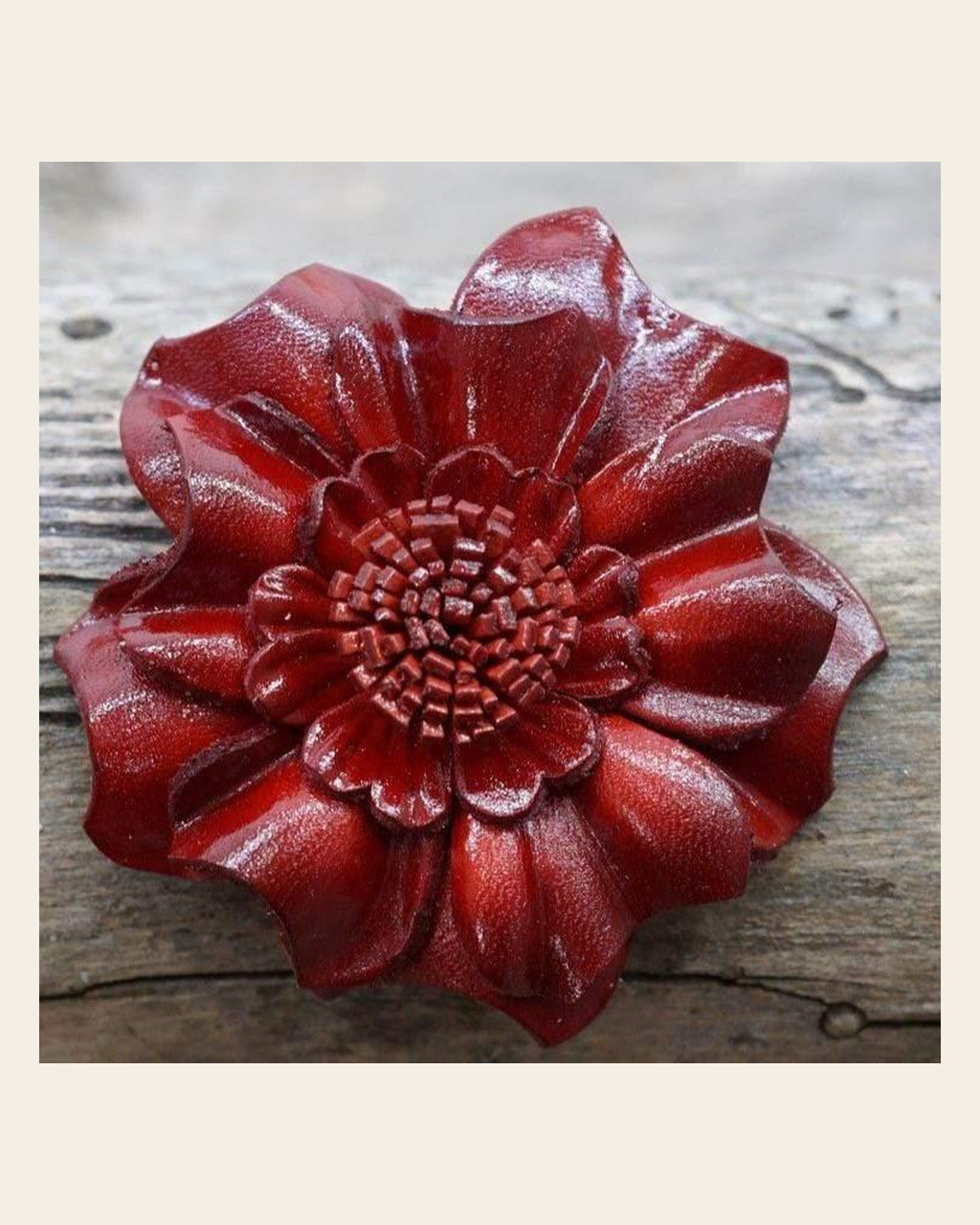 Red Carnation Leather Flower on a warm cream background
