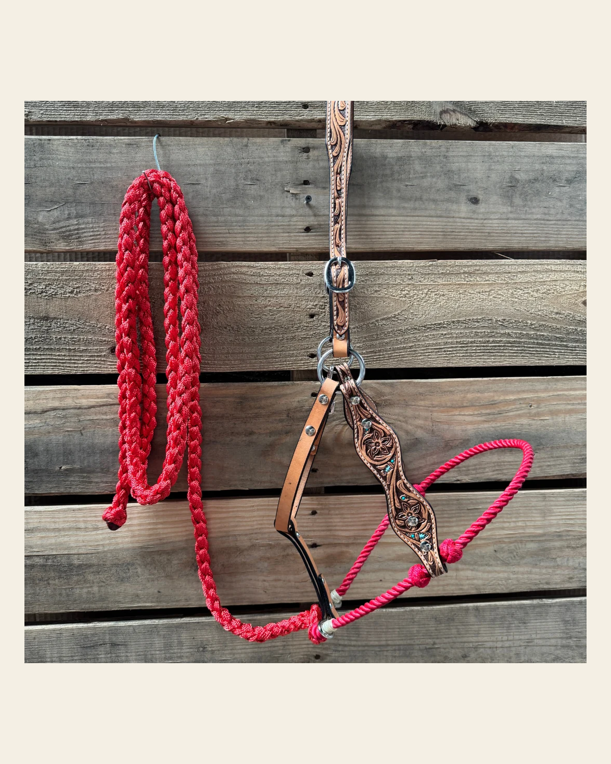 Red Floral Tooled Lariat & Leather Combo Halter on a warm cream background