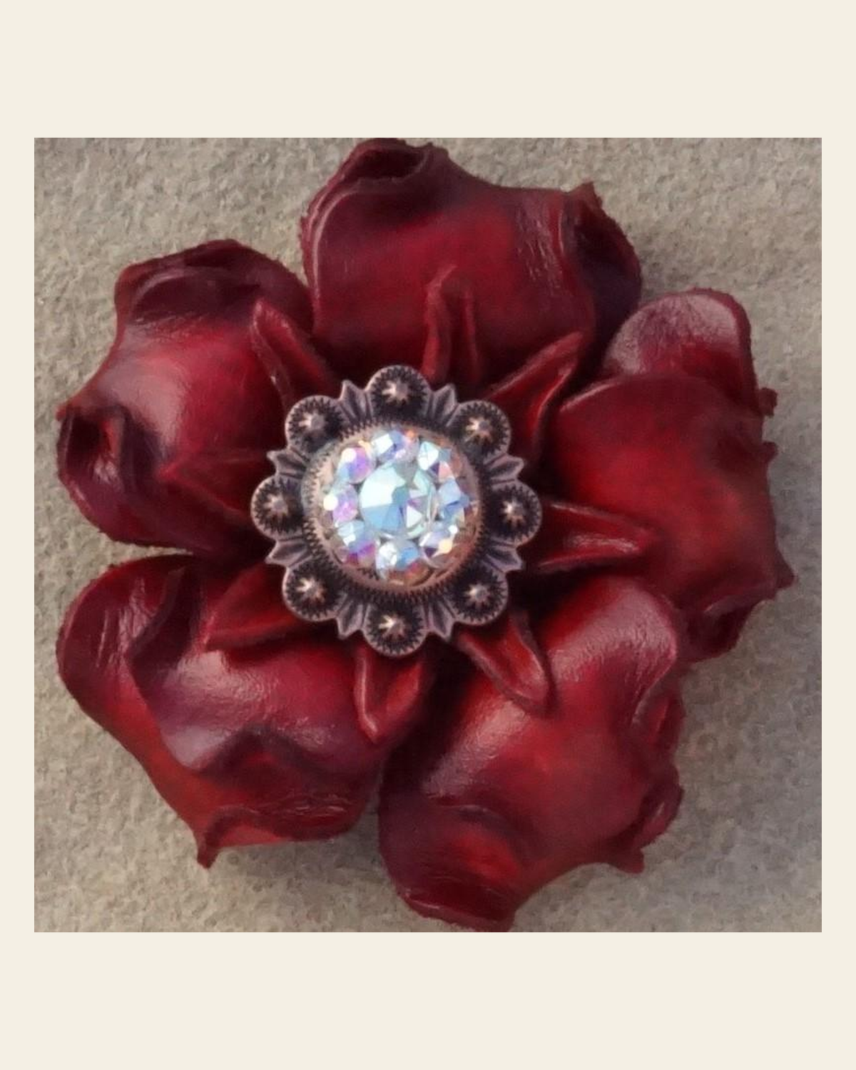 Red Gardenia Flower With Copper AB 1" Concho on a warm cream background