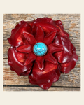 Red Gardenia Flower With Round Turquoise Cabochon on a warm cream background