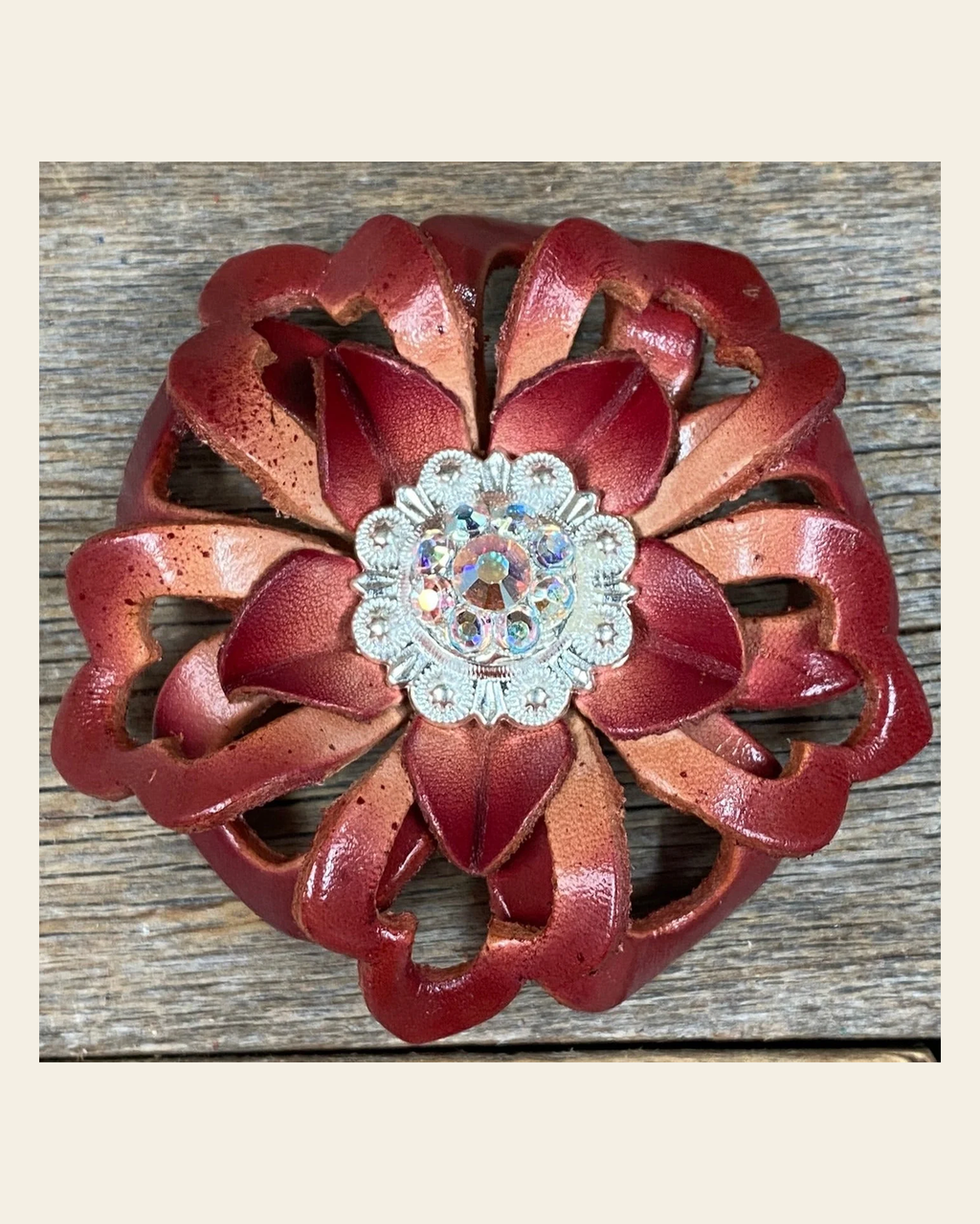 Red Lotus Flower With Bright Silver AB 1" Concho on a warm cream background