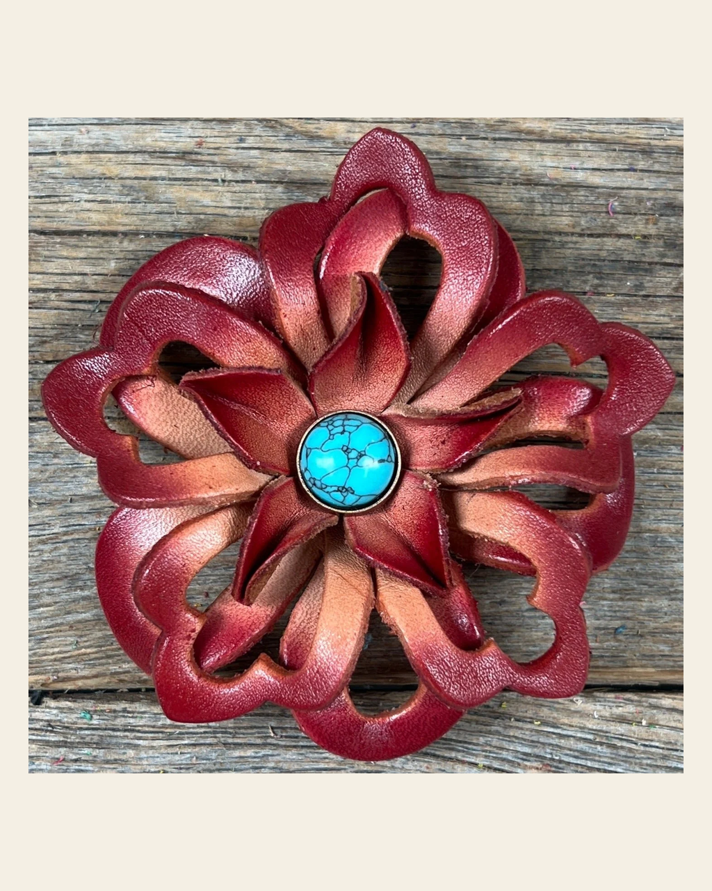 Red Lotus Flower With Round Turquoise Cabochon on a warm cream background