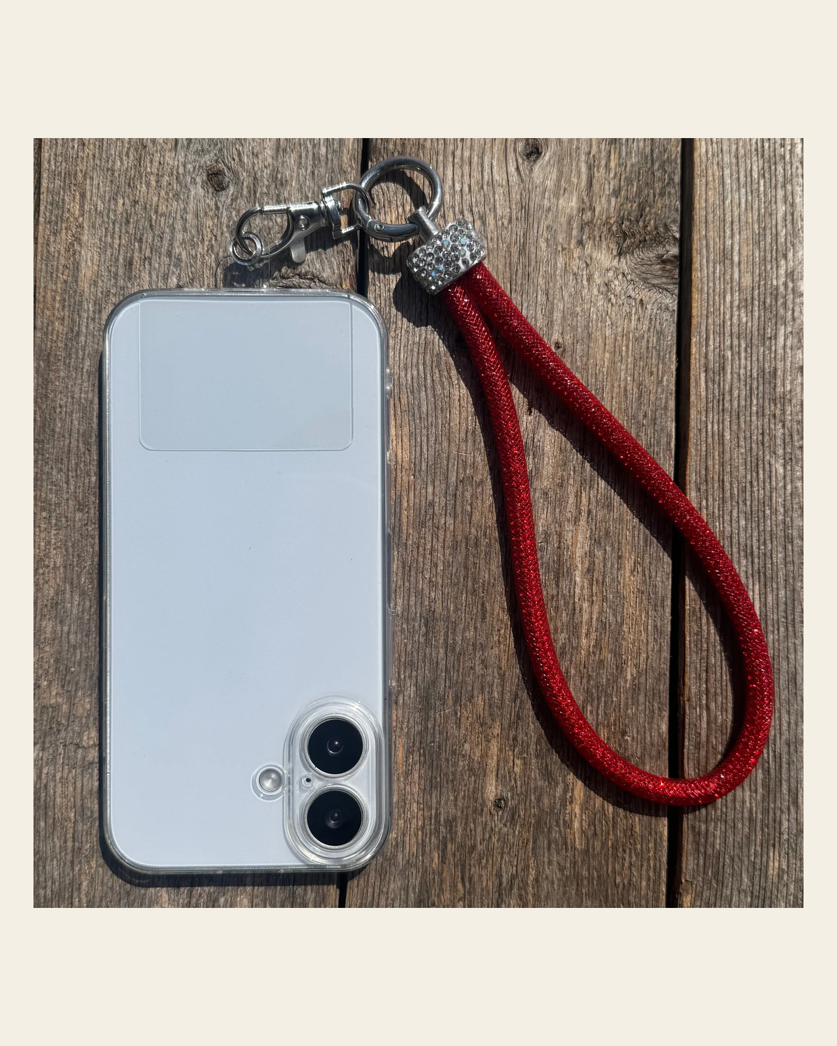 Red Rhinestone Cell Phone Wristlet #CPW100 on a warm cream background