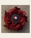 Red Rose Flower With Antique Silver Red & AB 1" Concho on a warm cream background