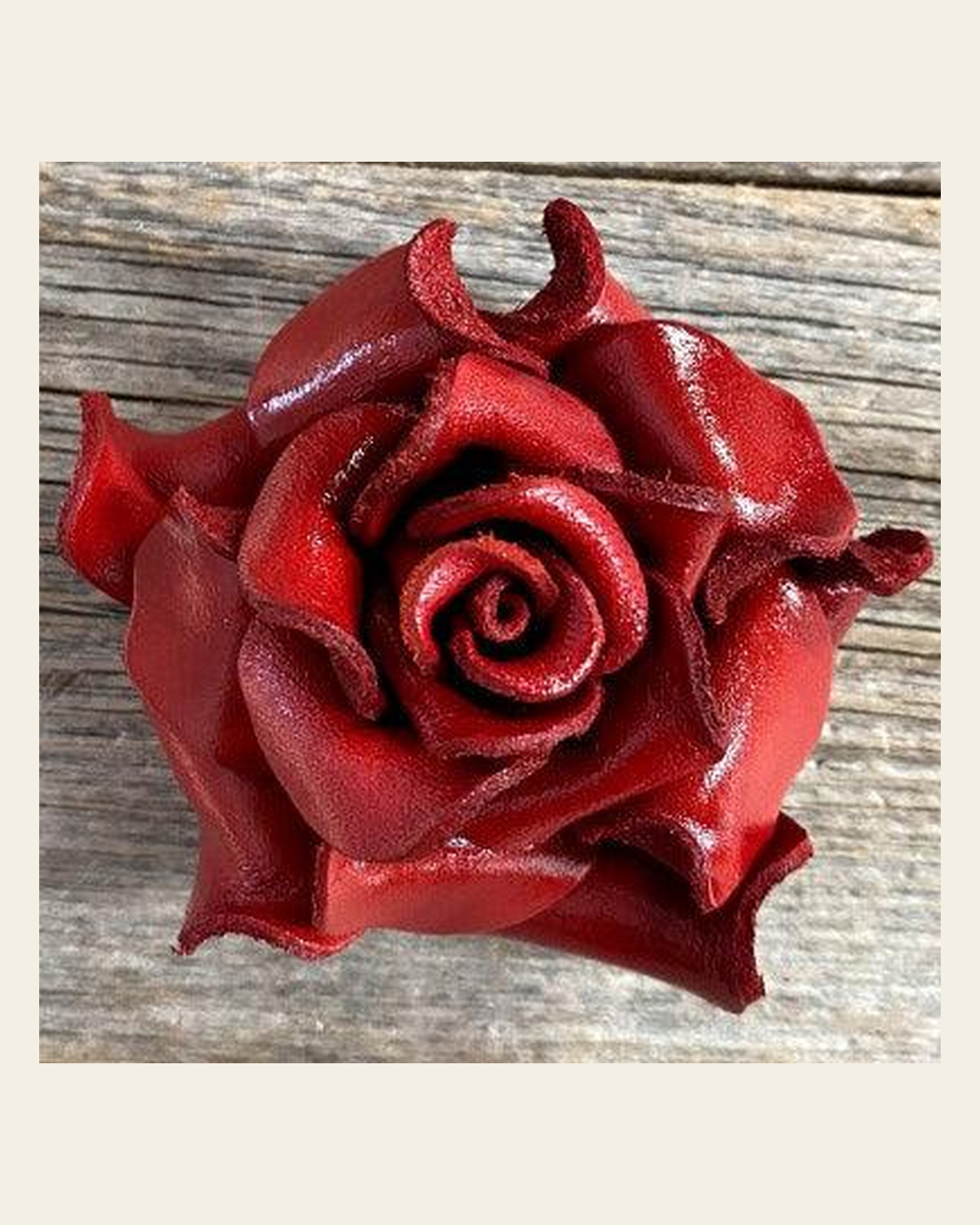 Red Rose Leather Flower on a warm cream background